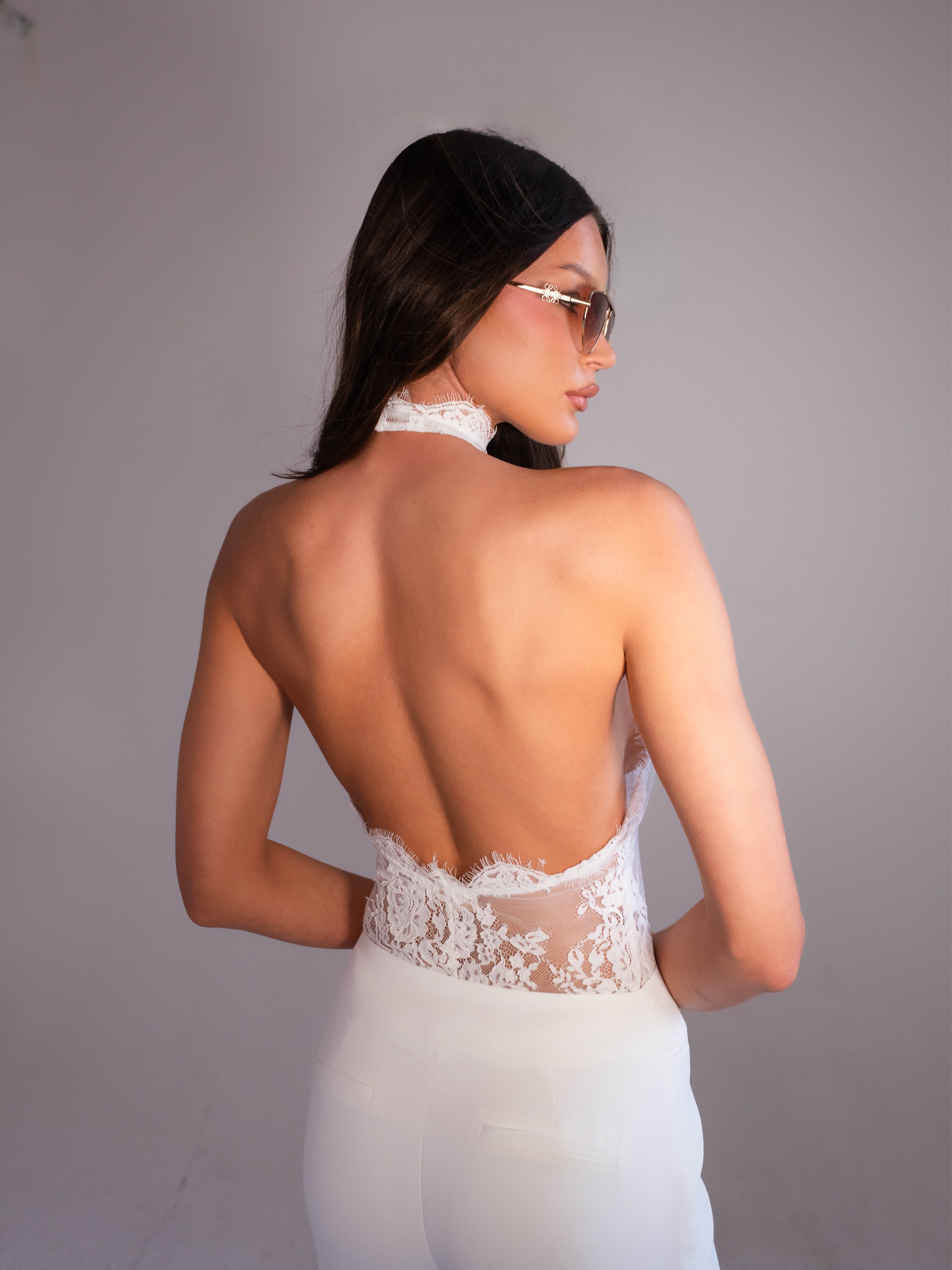 La Femme Sleeveless White Blouse